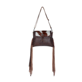Carved Blossoms Leather & Hairon Bag has a 22" shoulder strap