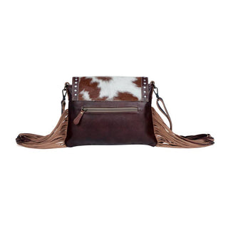 Carved Blossoms Leather & Hairon Bag with a zipper pocket on backside