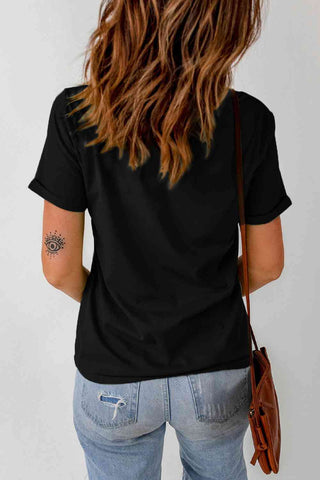 I'm Just Here For The Boos black t-shirt with Halloween ghost graphic has a solid back.
