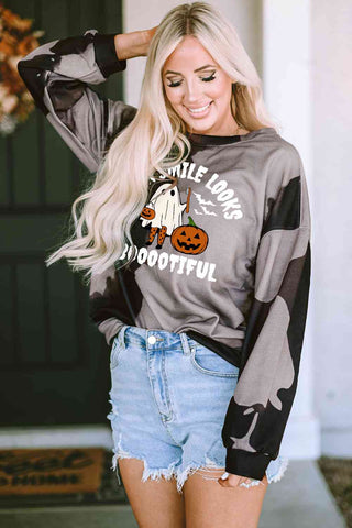 Smile Looks Boootiful Ghost Graphic Round Neck Sweatshirt goes with a lot of outfits